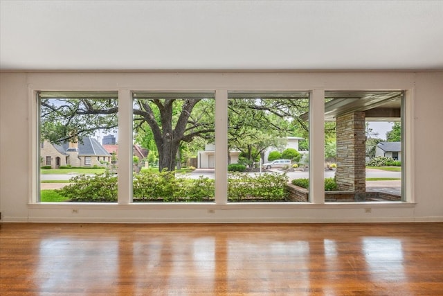 2900 Simondale Dr, Fort Worth, TX 76109 - unfurnished room featuring wood finished floors, plenty of natural light, and baseboards