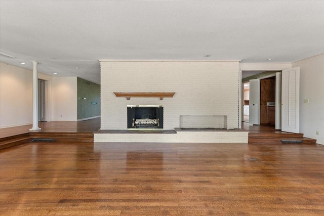 2900 Simondale Dr, Fort Worth, TX 76109 - unfurnished living room with a fireplace, wood finished floors, and recessed lighting