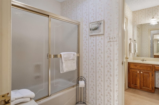 17881 Silver Leaf, Flint, TX 75762 - bathroom featuring wallpapered walls, enclosed tub / shower combo, vanity, and a textured ceiling