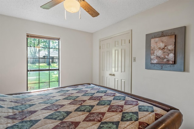 17881 Silver Leaf, Flint, TX 75762 - bedroom with a textured ceiling, ceiling fan, and a closet