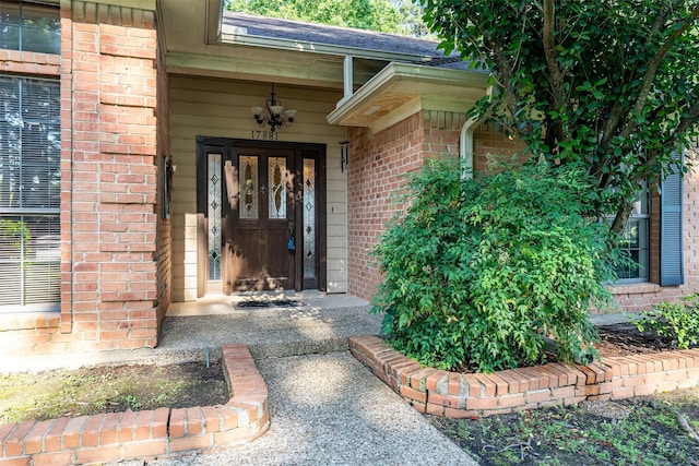 17881 Silver Leaf, Flint, TX 75762 - view of exterior entry featuring brick siding and roof with shingles