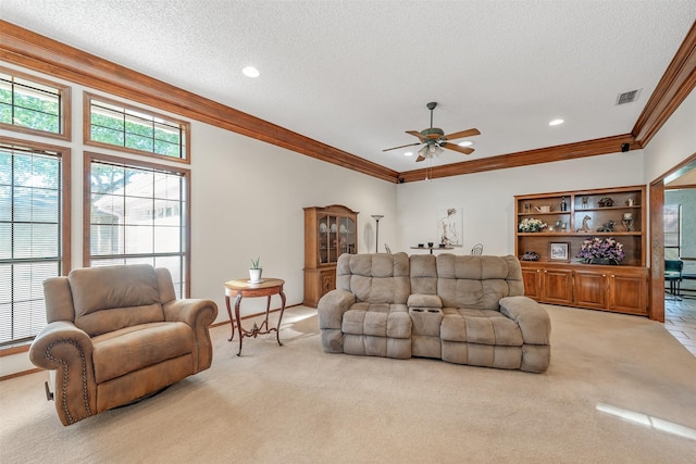 17881 Silver Leaf, Flint, TX 75762 - living area featuring light carpet, a ceiling fan, a textured ceiling, ornamental molding, and recessed lighting