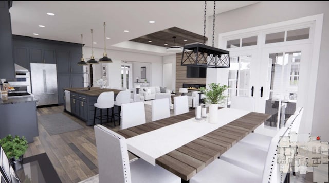 TBDSinclair Latigo Way, Weatherford, TX 76088 - dining area featuring dark wood-type flooring, recessed lighting, and a lit fireplace