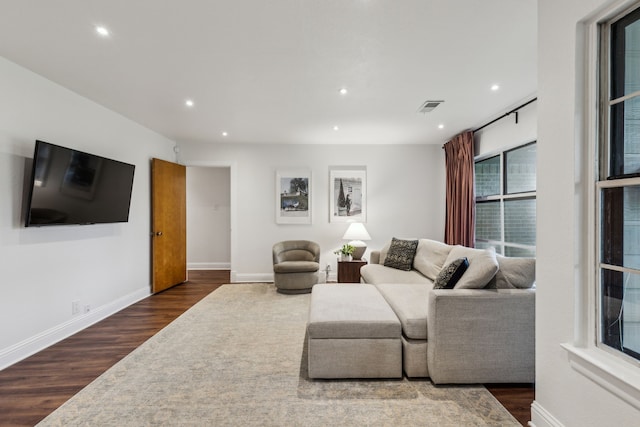 3351 Santa Teresa Ave, Dallas, TX 75228 - living area featuring dark wood-style flooring, recessed lighting, and baseboards