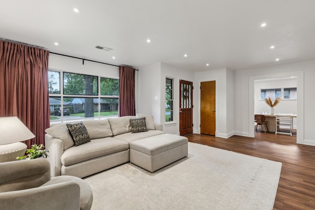 3351 Santa Teresa Ave, Dallas, TX 75228 - living room with recessed lighting, dark wood-type flooring, and baseboards