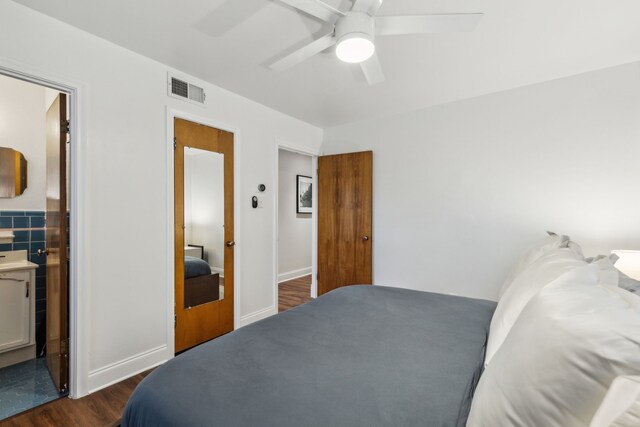 3351 Santa Teresa Ave, Dallas, TX 75228 - bedroom featuring dark wood-style floors and a ceiling fan