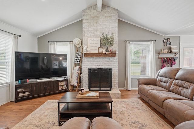 4602 Marlboro Dr, Abilene, TX 79606 - living area featuring wood finished floors, a fireplace, and baseboards