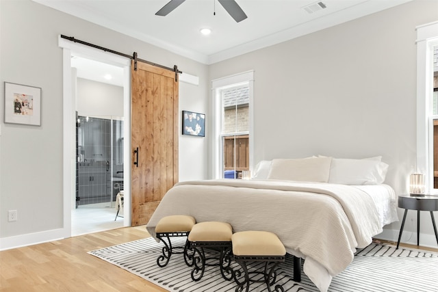 2410 Somercrest Pl, Midlothian, TX 76065 - bedroom featuring a barn door, wood finished floors, baseboards, recessed lighting, and a ceiling fan