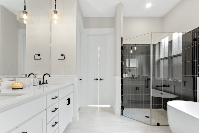 2410 Somercrest Pl, Midlothian, TX 76065 - bathroom with a shower stall, a freestanding tub, and double vanity