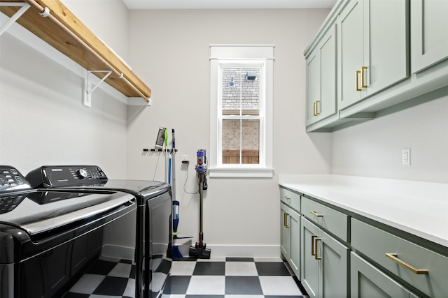 2410 Somercrest Pl, Midlothian, TX 76065 - laundry area with dark floors, independent washer and dryer, cabinet space, and baseboards