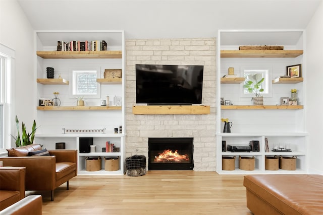 2410 Somercrest Pl, Midlothian, TX 76065 - living room with wood finished floors and a brick fireplace
