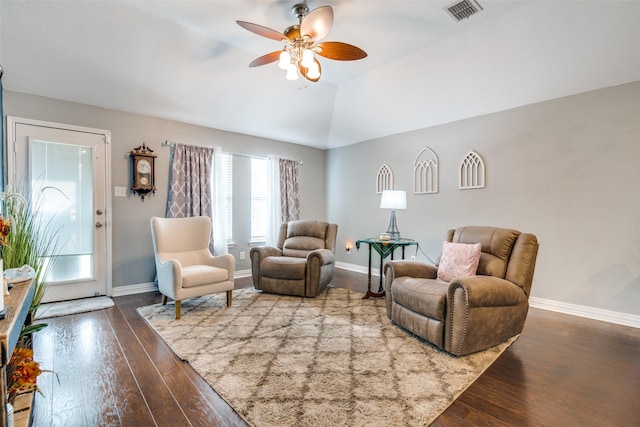 4002 Silver Lake Trl, Heartland, TX 75126 - living room featuring dark wood-type flooring, ceiling fan, baseboards, and lofted ceiling
