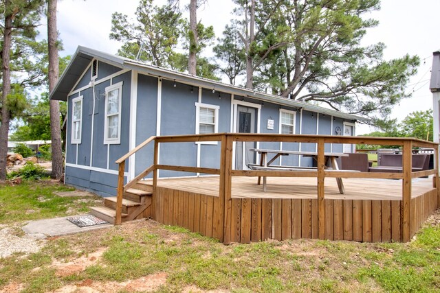 179 Oak St, Nocona, TX 76255 - view of yard featuring a deck