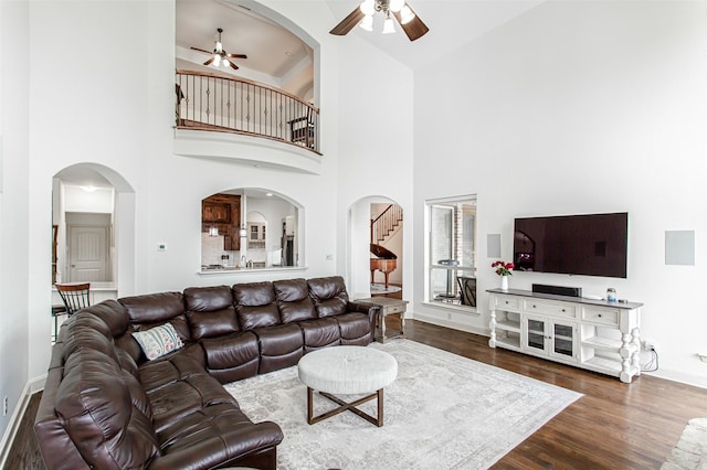 968 Fairfield Ln, Allen, TX 75013 - living area with ceiling fan, baseboards, high vaulted ceiling, and dark wood-style floors