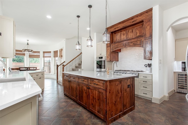 968 Fairfield Ln, Allen, TX 75013 - kitchen with a sink, stainless steel oven, beverage cooler, tasteful backsplash, and recessed lighting