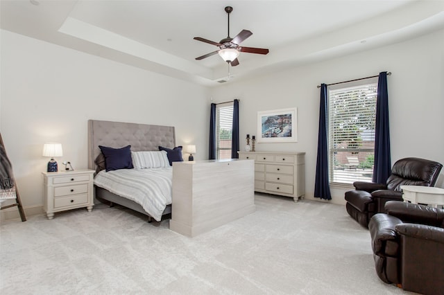 968 Fairfield Ln, Allen, TX 75013 - bedroom featuring light carpet, a raised ceiling, and a ceiling fan