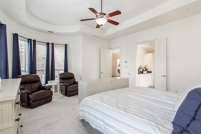 968 Fairfield Ln, Allen, TX 75013 - bedroom featuring a raised ceiling, light carpet, and a ceiling fan