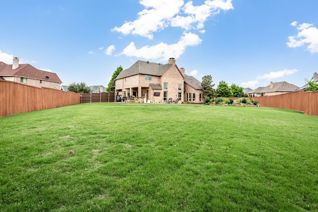 968 Fairfield Ln, Allen, TX 75013 - back of property featuring a chimney and brick siding