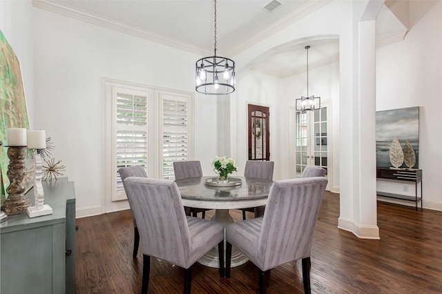 968 Fairfield Ln, Allen, TX 75013 - dining space with a chandelier, arched walkways, plenty of natural light, ornamental molding, and dark wood-style floors