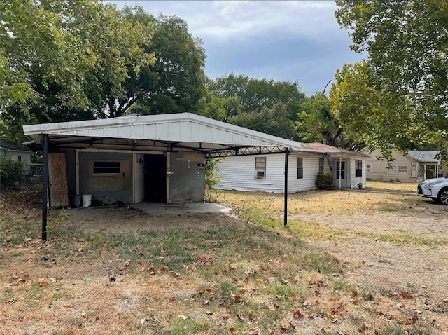 307 N 4th St, Crandall, TX 75114 - exterior space featuring a detached carport