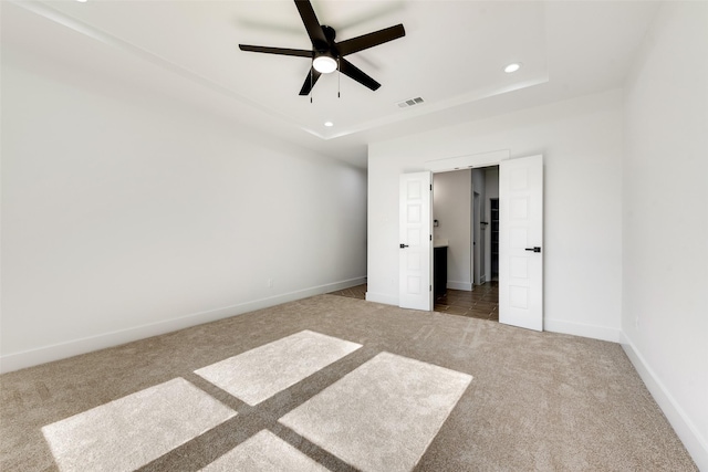 9320 Beckleycrest Ave, Dallas, TX 75232 - unfurnished bedroom with carpet flooring, recessed lighting, baseboards, a raised ceiling, and a ceiling fan