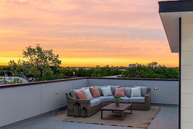 1921 Pollard St, Dallas, TX 75208 - patio terrace at dusk with outdoor lounge area and a balcony