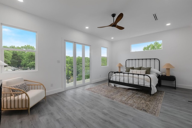 1921 Pollard St, Dallas, TX 75208 - bedroom featuring access to exterior, baseboards, wood finished floors, recessed lighting, and ceiling fan