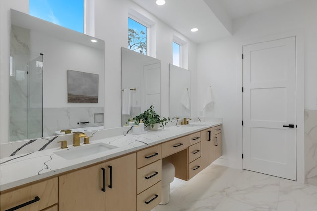 1921 Pollard St, Dallas, TX 75208 - bathroom featuring marble finish flooring, a marble finish shower, double vanity, and recessed lighting