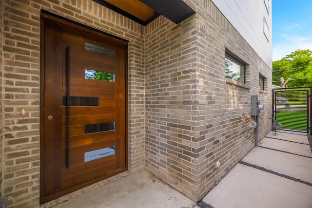 1921 Pollard St, Dallas, TX 75208 - property entrance featuring brick siding