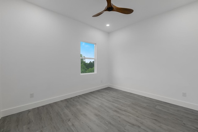 1921 Pollard St, Dallas, TX 75208 - empty room featuring baseboards, dark wood-style flooring, recessed lighting, and a ceiling fan
