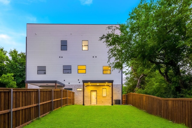 1921 Pollard St, Dallas, TX 75208 - rear view of house with cooling unit and brick siding