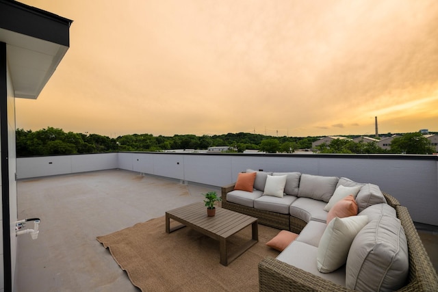 1921 Pollard St, Dallas, TX 75208 - patio terrace at dusk featuring an outdoor hangout area