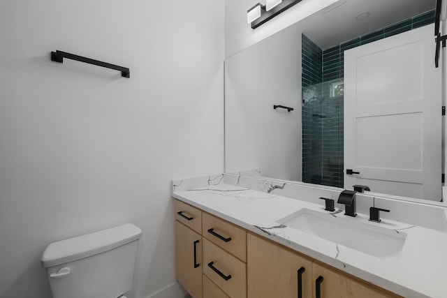 1921 Pollard St, Dallas, TX 75208 - bathroom featuring toilet, a tile shower, and vanity