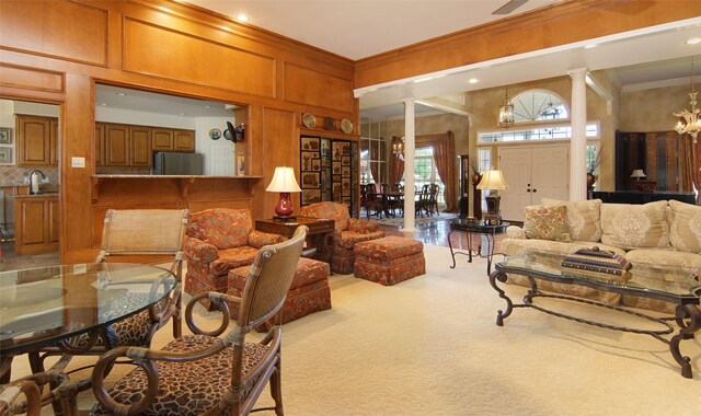1706 Kiowa, Graham, TX 76450 - living room featuring ornate columns, ornamental molding, and a chandelier