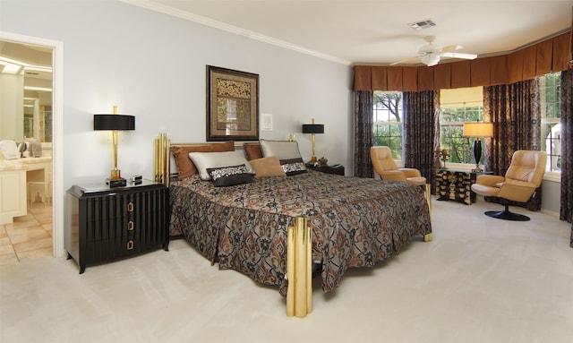 1706 Kiowa, Graham, TX 76450 - bedroom featuring light carpet, crown molding, connected bathroom, and ceiling fan