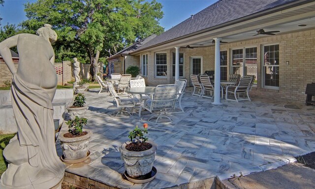 1706 Kiowa, Graham, TX 76450 - view of patio / terrace with outdoor dining area and ceiling fan