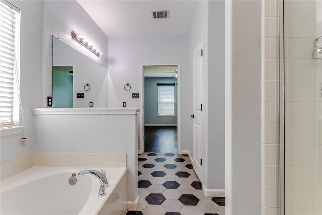 2007 Brazoria Dr, Forney, TX 75126 - full bath featuring a bath and tile patterned flooring