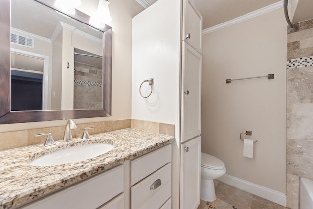 bathroom featuring ornamental molding, toilet, vanity, baseboards, and tile patterned flooring