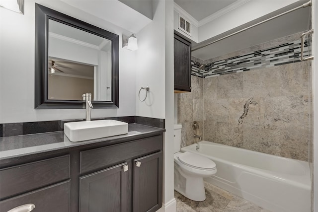 full bath featuring ornamental molding, vanity, toilet, shower / tub combination, and a ceiling fan