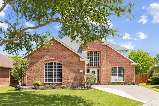 1016 Hidden Creek Ct, Allen, TX 75002 - traditional-style house featuring brick siding and roof with shingles