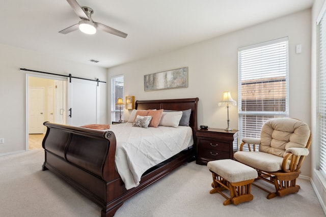 1016 Hidden Creek Ct, Allen, TX 75002 - carpeted bedroom with a barn door, baseboards, and a ceiling fan
