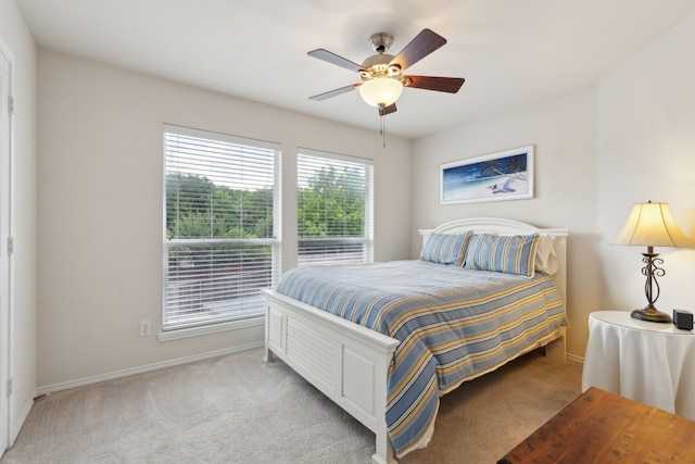 1016 Hidden Creek Ct, Allen, TX 75002 - bedroom with light carpet, baseboards, and ceiling fan
