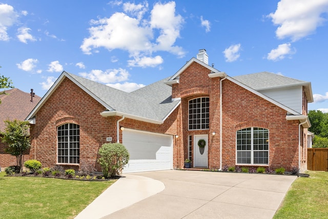 1016 Hidden Creek Ct, Allen, TX 75002 - traditional-style house featuring brick siding, an attached garage, and concrete driveway
