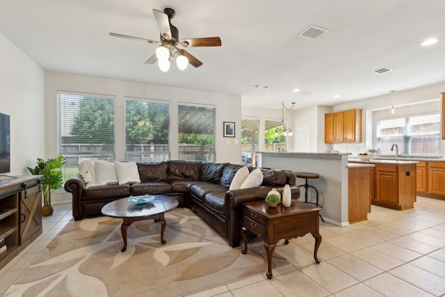 1016 Hidden Creek Ct, Allen, TX 75002 - living area with plenty of natural light, ceiling fan, light tile patterned floors, and recessed lighting