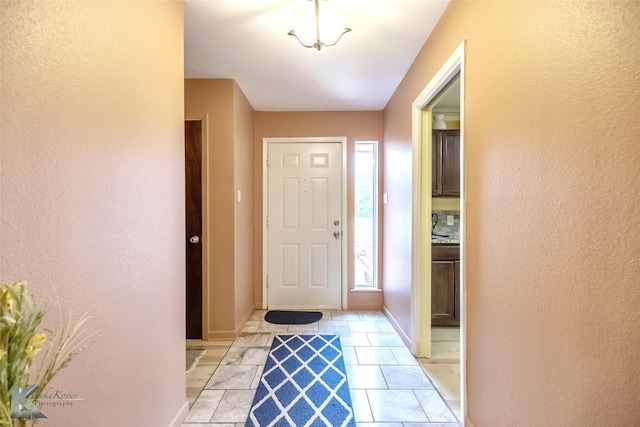 649 Westwood Dr, Abilene, TX 79603 - entryway with a textured wall and baseboards