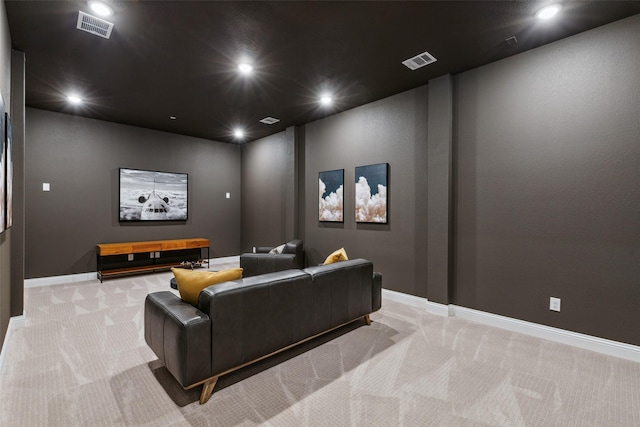 cinema with light colored carpet, baseboards, and recessed lighting