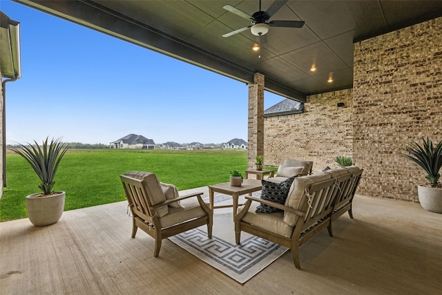 view of patio featuring ceiling fan and an outdoor living space