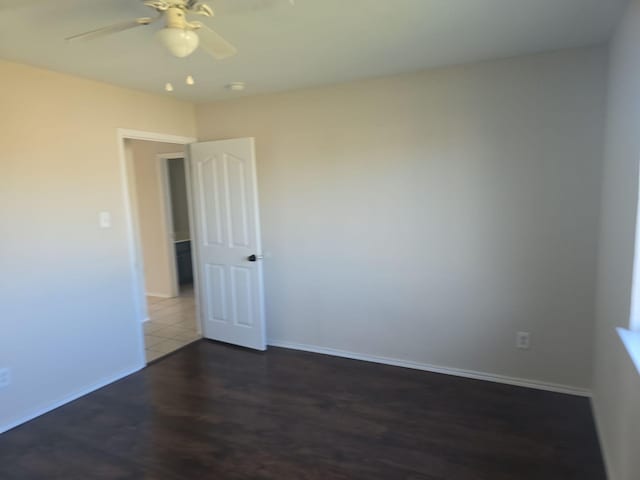 8313 French Quarter Ln, Fort Worth, TX 76123 - empty room with ceiling fan, wood finished floors, and baseboards