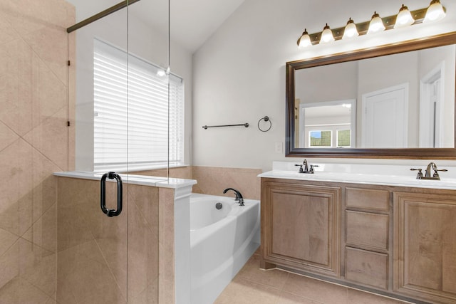 1105 Pigeon Hawk Dr, Little Elm, TX 75068 - full bath featuring a garden tub, tile patterned floors, a shower stall, double vanity, and lofted ceiling