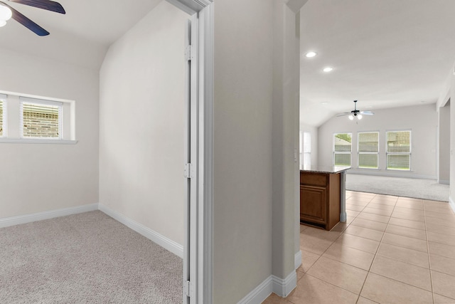 1105 Pigeon Hawk Dr, Little Elm, TX 75068 - hall featuring vaulted ceiling, light carpet, plenty of natural light, baseboards, and recessed lighting